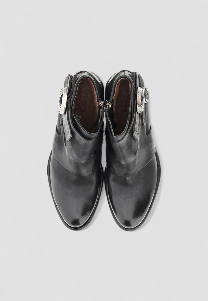 BOTIN CURE NEGRO