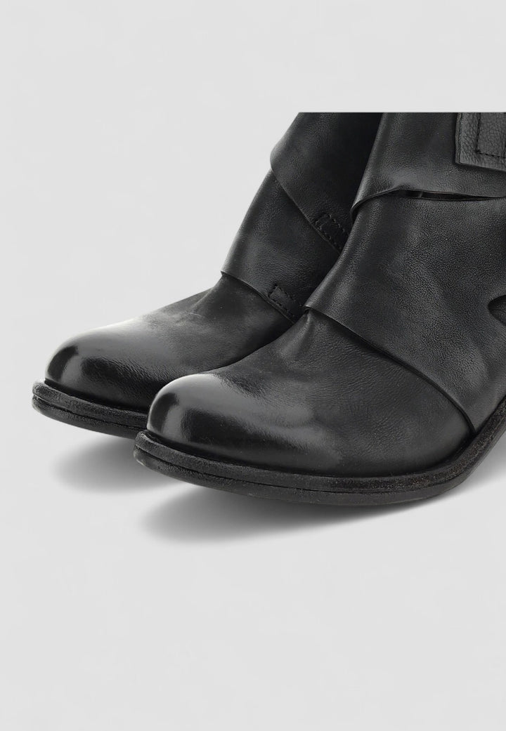BOTIN CURE NEGRO